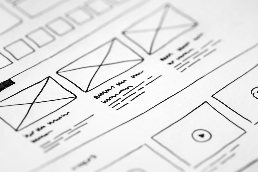 Hand-drawn website wireframe sketches